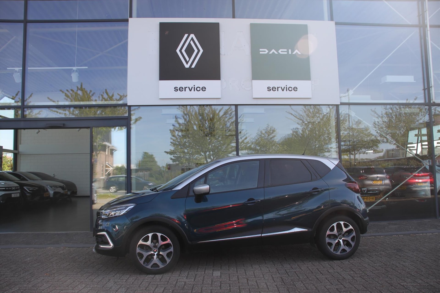 Renault Captur - 90PK-INTENS-76DKM-NAVI-CLIMA-CAMERA-LMV-PDC- - AutoWereld.nl