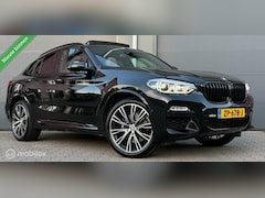 BMW X4 - xDrive20i High Executive M-Sport Pano.dak/H&K/Leder/21"