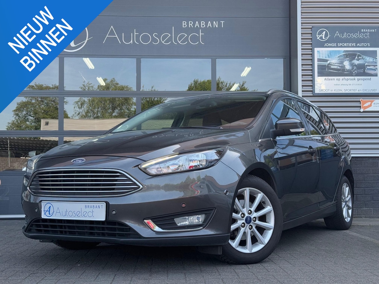 Ford Focus Wagon - 1.0 EcoBoost Titanium Clima Cruise Navi - AutoWereld.nl
