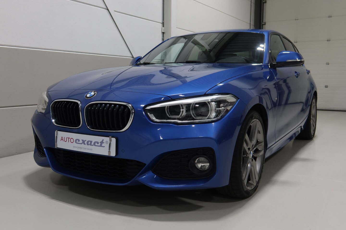 BMW 1-serie - 125i Executive I M-Pakket I org NL I Estoril blauw - AutoWereld.nl