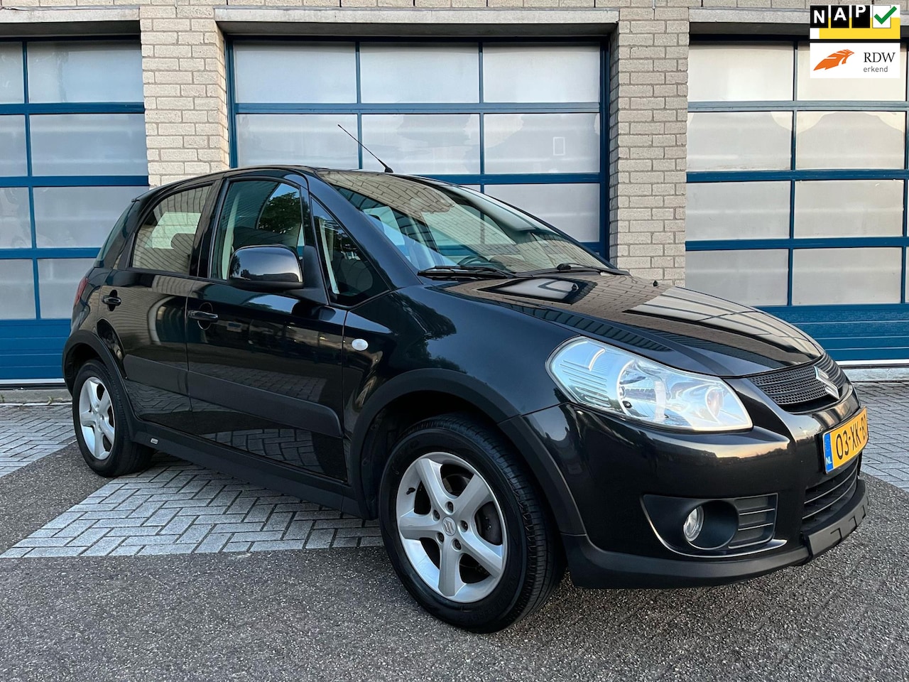 Suzuki SX4 - 1.6 Exclusive 5drs - Airco - Trekhaak - Camera - NAP - Goed onderhouden - AutoWereld.nl