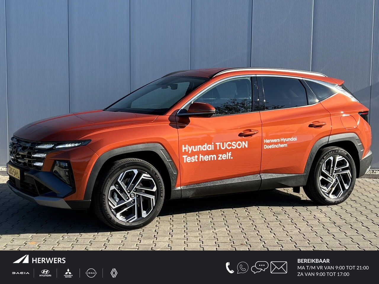 Hyundai Tucson - 1.6 T-GDI PHEV Premium / 4WD /  Navigatie / Elektrische Stoel met Geheugenfunctie / Achter - AutoWereld.nl