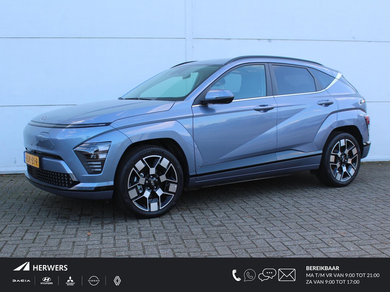 Hyundai Kona Electric - Premium 65.4 kWh / Lederen Bekleding / Bose / Stoelverwarming & Ventilatie / Navigatie + A - AutoWereld.nl