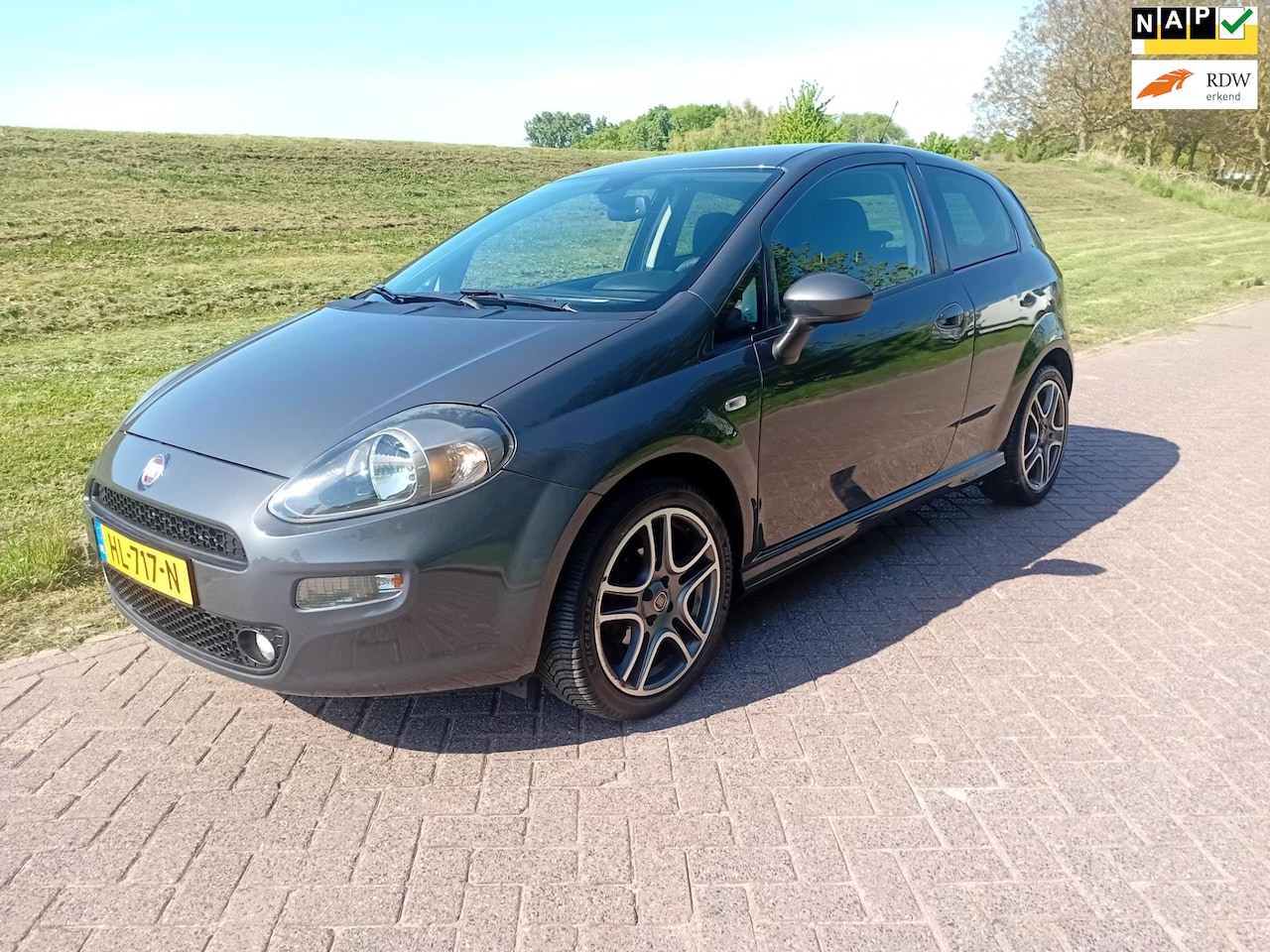 Fiat Punto Evo - 1.3 M-Jet Lounge climate cruise control rijdt 1 op 33 km 212.497 NAP - AutoWereld.nl