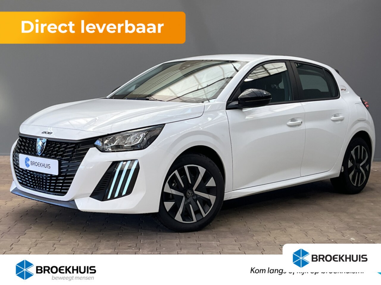 Peugeot 208 - Peugeot Style | Dashboard en deurpanelen in kunststof met carboneffect | Elektrisch verste - AutoWereld.nl