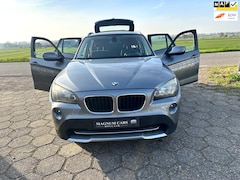 BMW X1 - SDrive18i Executive NAP/ AIRCO/ TREKHAAK / CRUISE / VELGEN