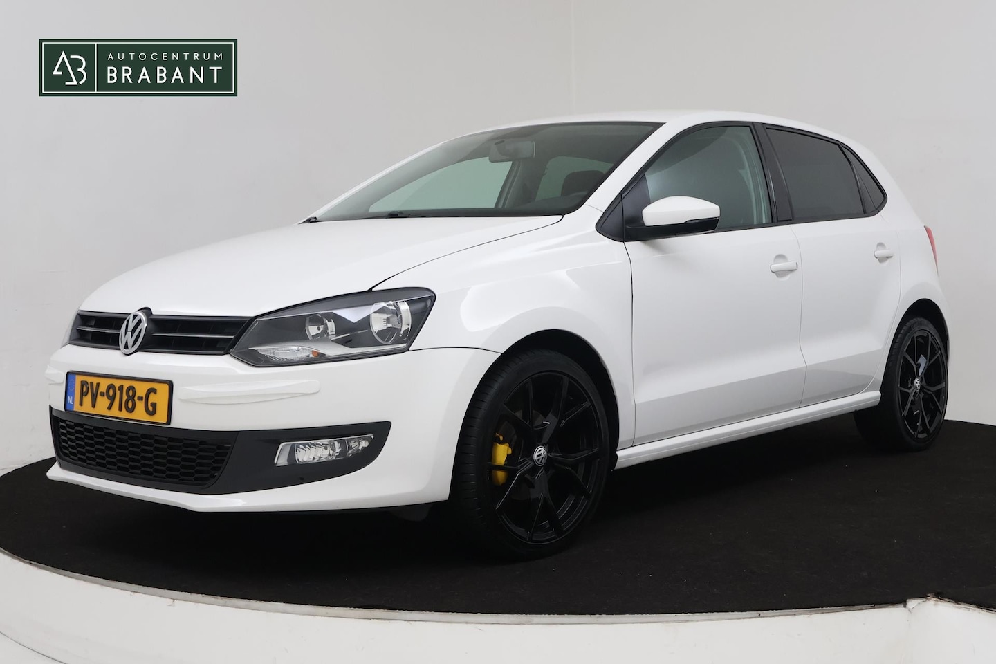 Volkswagen Polo - 1.4-16V Comfortline (NAVIGATIE, BLUETOOTH, CRUISE CONTROL, AIRCO) - AutoWereld.nl