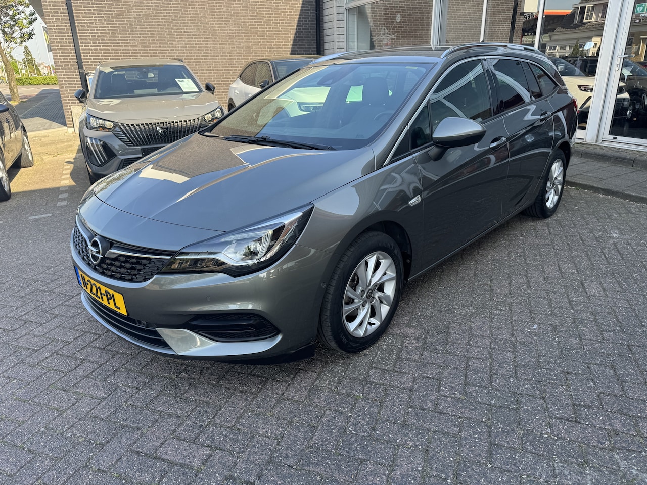 Opel Astra Sports Tourer - 1.2 Elegance Navi/Ecc/Pdc/Led/Apple Carplay - AutoWereld.nl