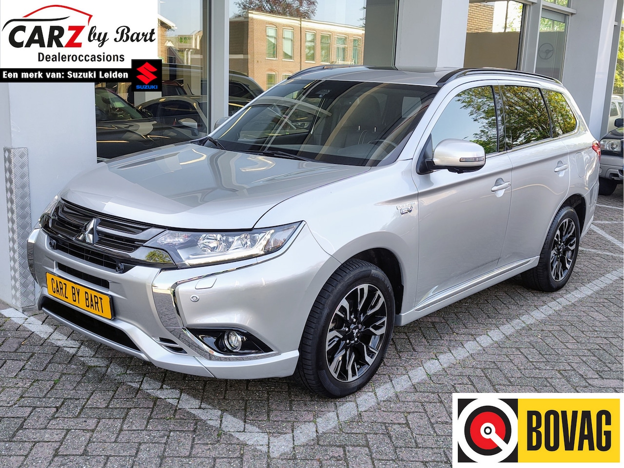 Mitsubishi Outlander - 2.0 PHEV PREMIUM+ CVT Trekhaak | Stuurverwarming | Open dak | Adaptive Cruise - AutoWereld.nl
