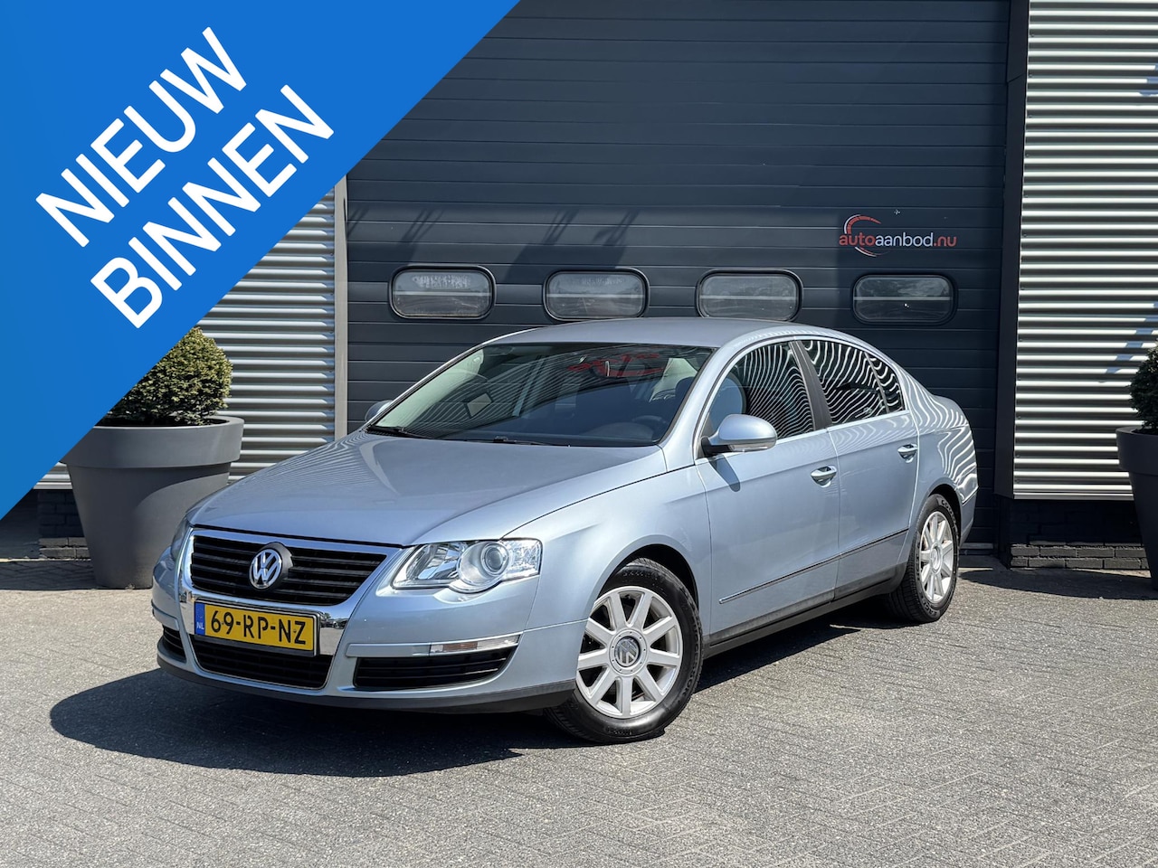 Volkswagen Passat - 2.0 FSI Sportline | Cruise Control | Airco | Xenon | Lichtmetalen Velgen | - AutoWereld.nl