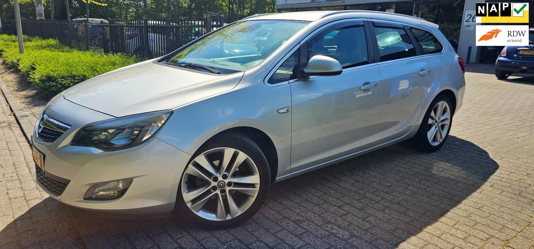 Opel Astra Sports Tourer - 1.4 Turbo Sport 1.4 Turbo Sport - AutoWereld.nl