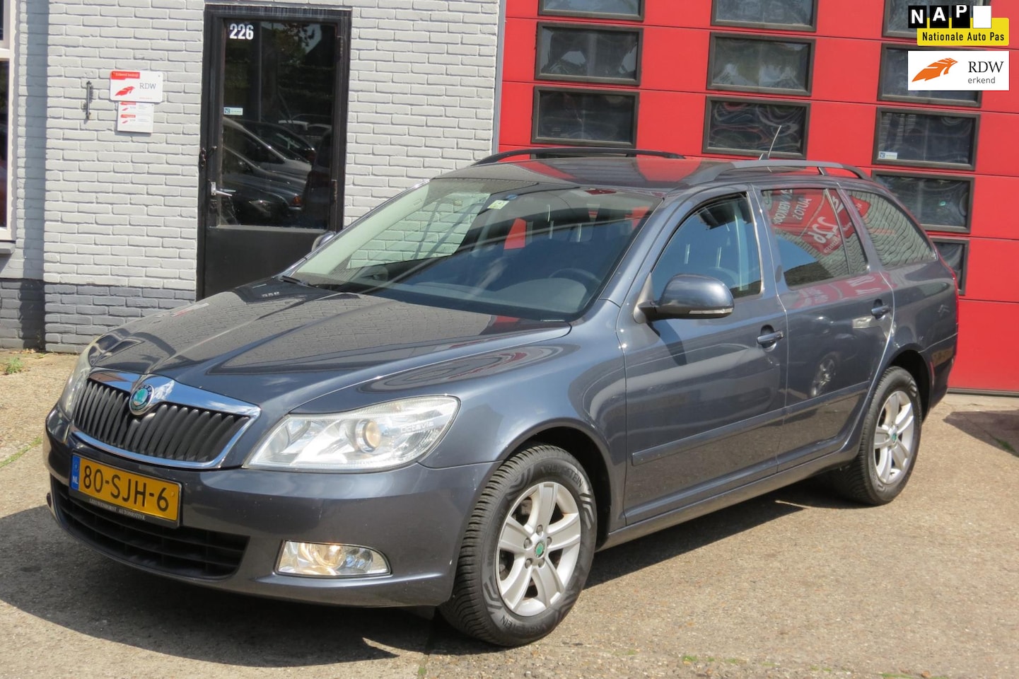 Skoda Octavia Combi - 1.2 TSI Ambition Business Line 1.2 TSI Ambition Business Line, AIRCO, NAVI - AutoWereld.nl
