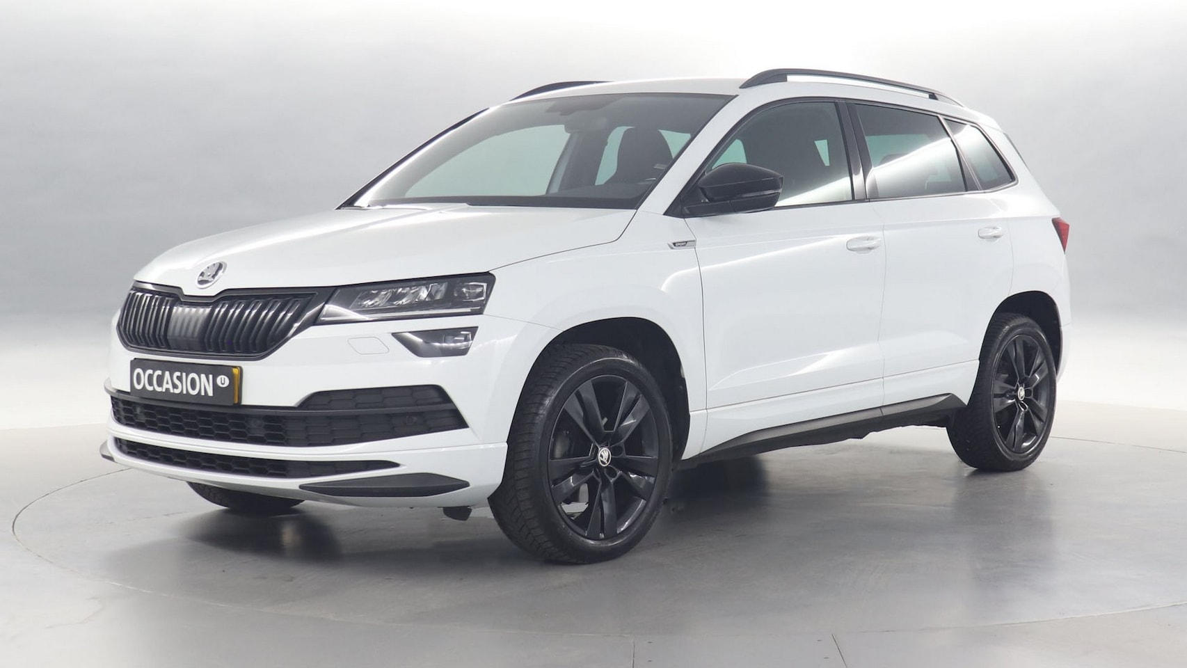 Skoda Karoq - 1.5 TSI 150pk ACT Sportline Business DSG / Navigatie / Camera / Trekhaak wegklapbaar - AutoWereld.nl