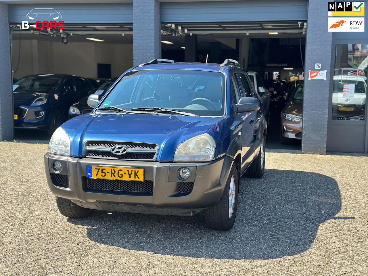 Hyundai Tucson - 2.0i Active Airco|Nap| - AutoWereld.nl