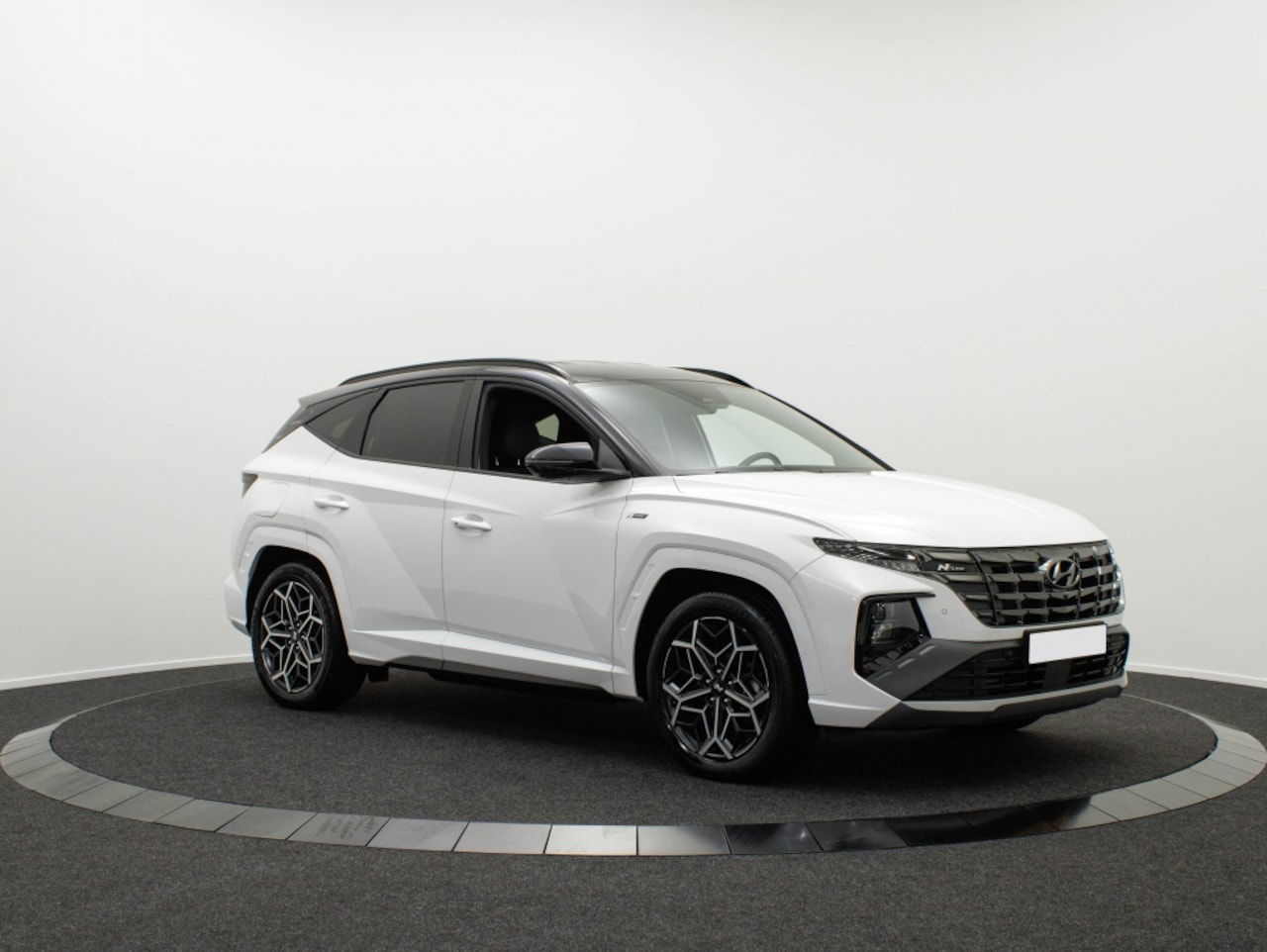 Hyundai Tucson - 1.6 T-GDI N Line | PHEV 4WD 265PK | Zwart dak - AutoWereld.nl