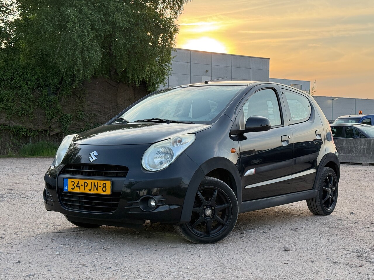 Suzuki Alto - 1.0 Exclusive/UNIEK/SPOILER/VELGEN - AutoWereld.nl