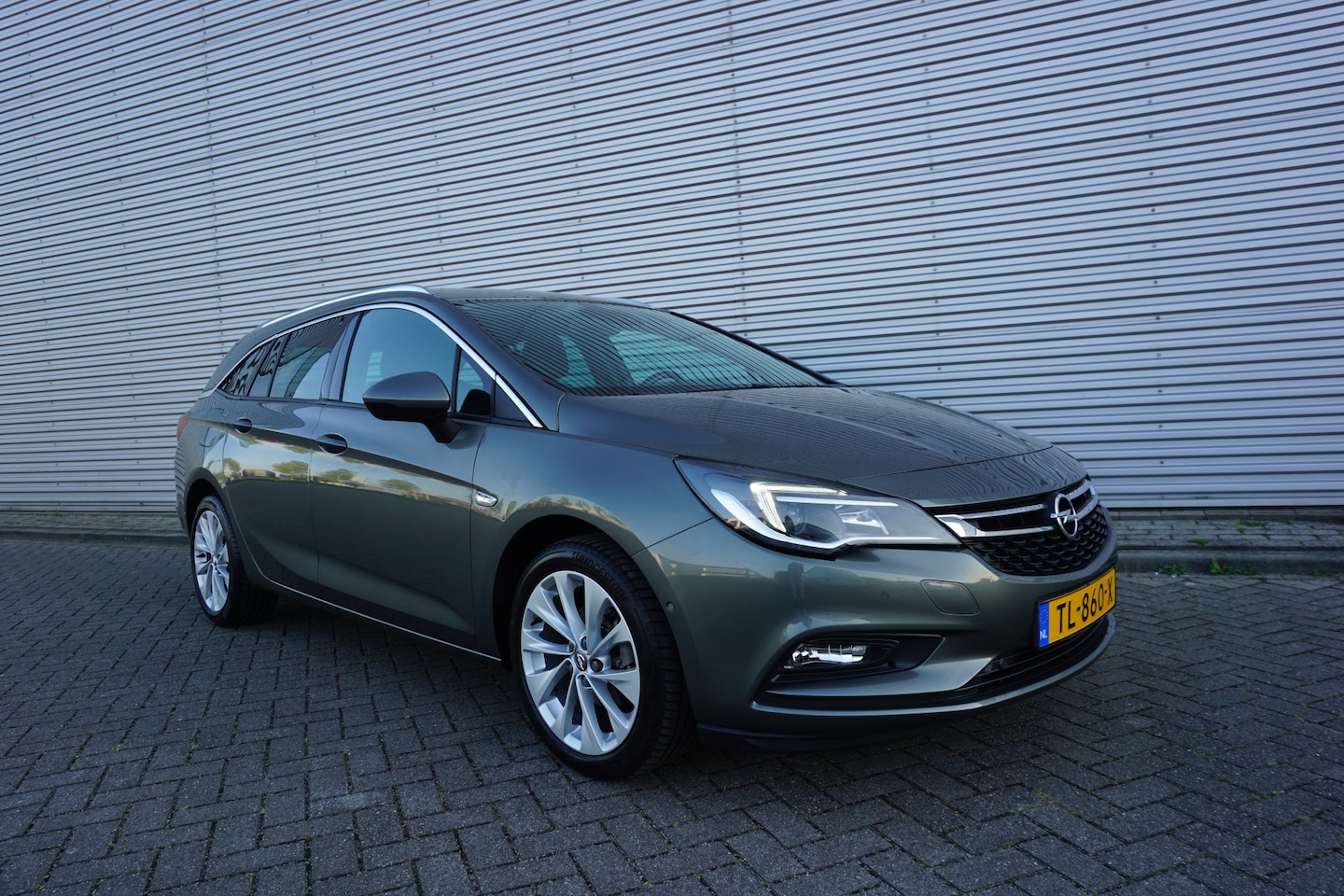 Opel Astra Sports Tourer - 1.4 Innovation Climate / Navi / Stoelverw. / Cruise / Parkeers. / Lane Ass. - AutoWereld.nl