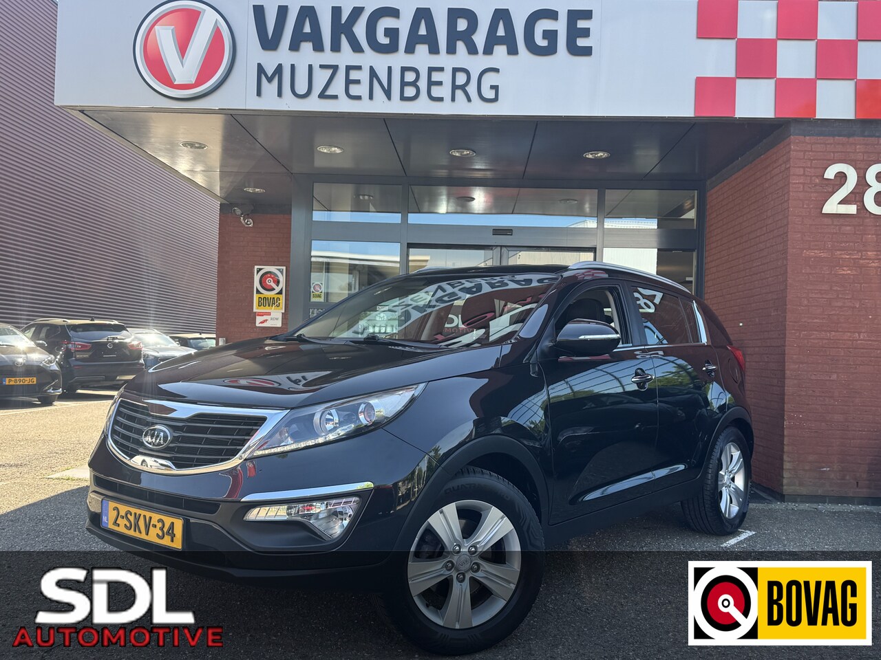 Kia Sportage - 2.0 X-ecutive // STOELVERWARMING // AIRCO // TREKHAAK // AUTOMAAT // - AutoWereld.nl
