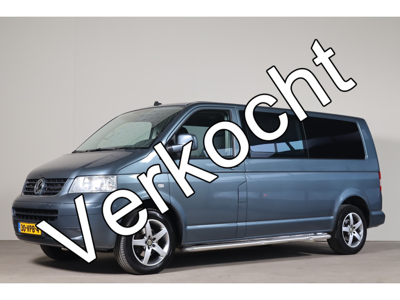 Volkswagen Transporter Caravelle - 2.5 TDI Climate I Navi I Trekhaak - AutoWereld.nl