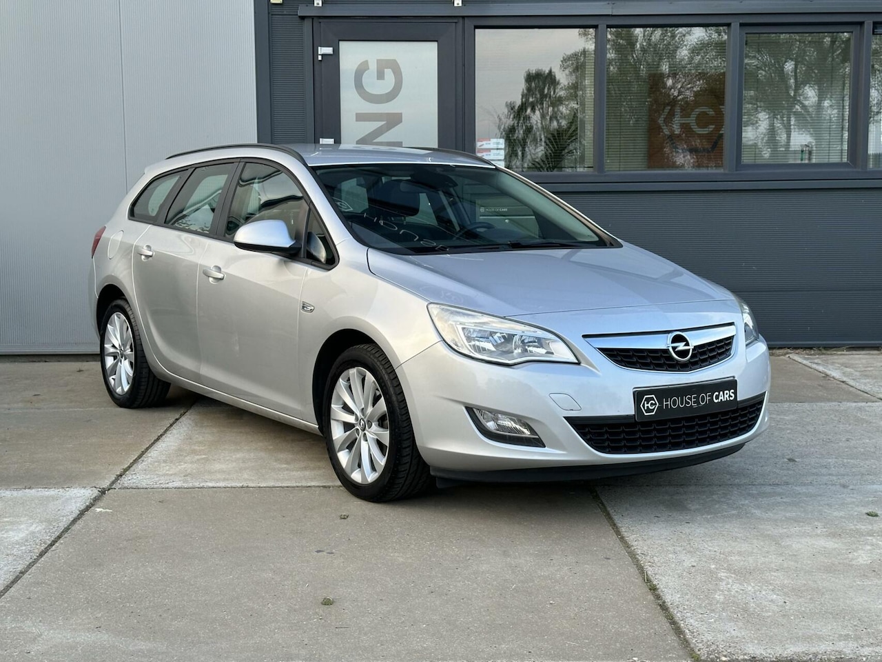 Opel Astra Sports Tourer - 1.4 Turbo Business + NAP - AutoWereld.nl