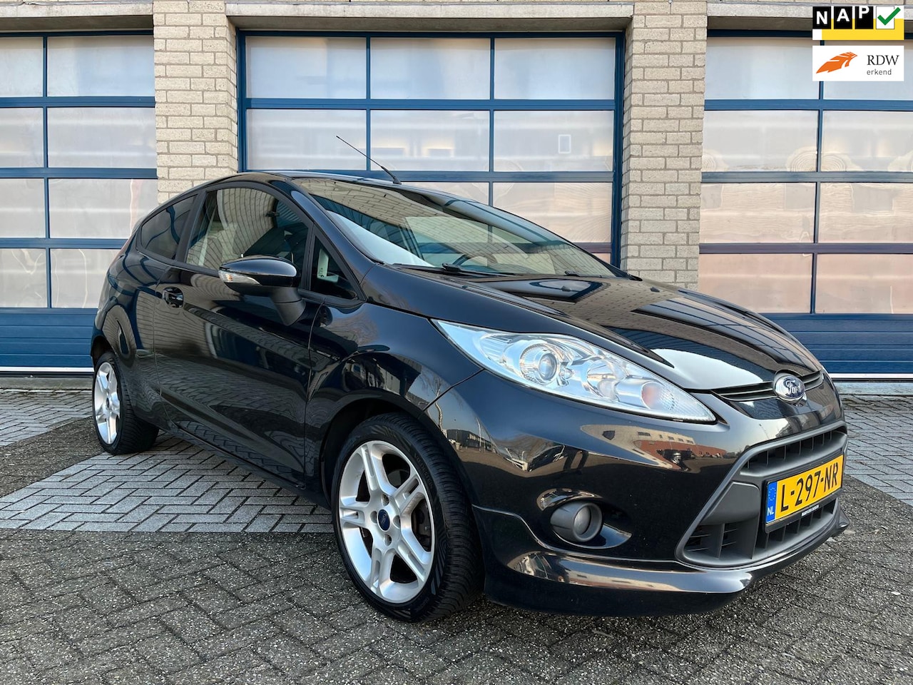 Ford Fiesta - 1.4 97 pk Clima - Sportstoelen - Stoelverwarming - Goed onderhouden - Lm velgen - AutoWereld.nl