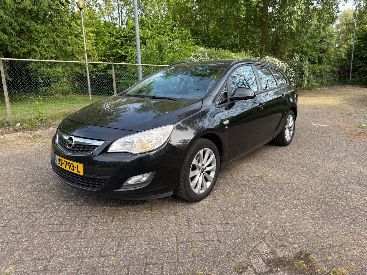Opel Astra Sports Tourer - 1.4 Turbo Sport Cruise Black Magic - AutoWereld.nl