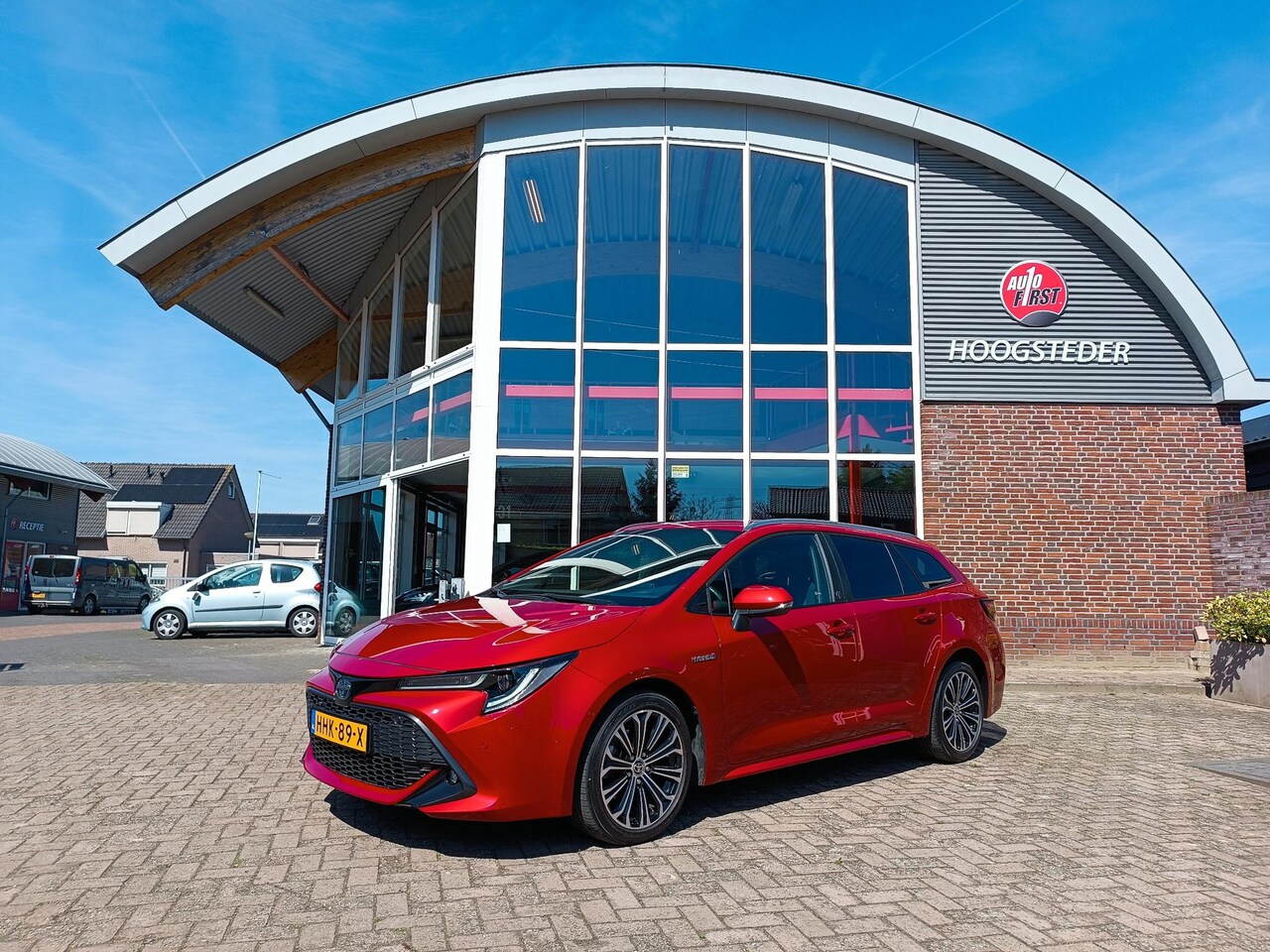 Toyota Corolla Touring Sports - 2.0 Hybrid Dynamic Team D - AutoWereld.nl