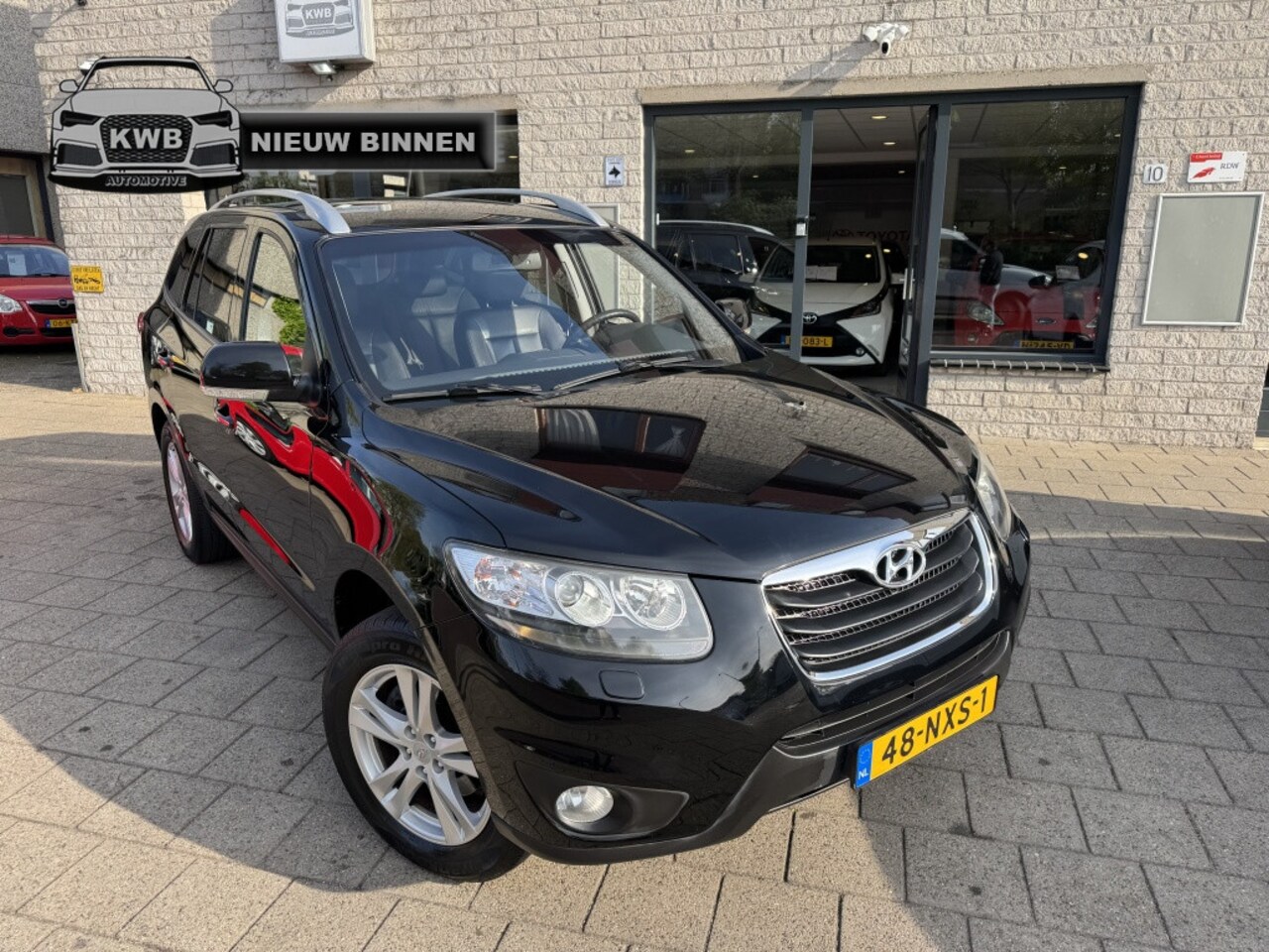 Hyundai Santa Fe - 2.4i Style airco apk clima leer trekhaak - AutoWereld.nl