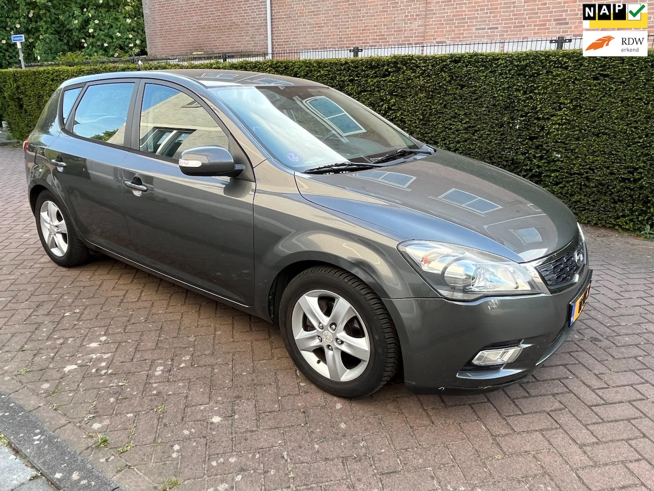 Kia Cee'd - 1.4 CVVT X-ecutive 1.4 CVVT X-ecutive - AutoWereld.nl