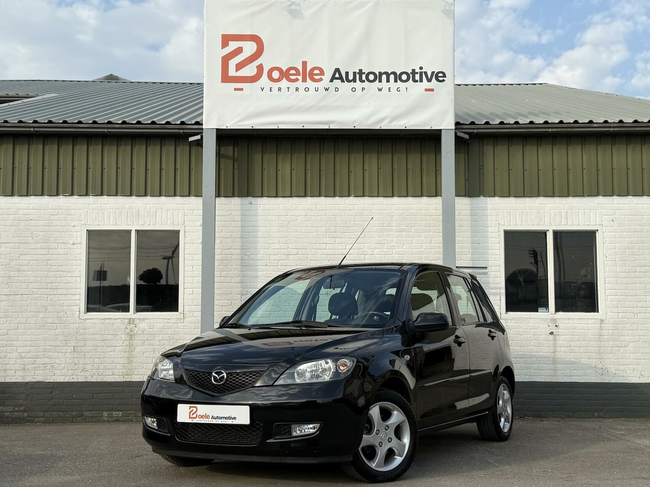 Mazda 2 - 1.6 Sportive / 2e Eig. / Dealer Ondh. / Airco / PDC /Trekhaak - AutoWereld.nl