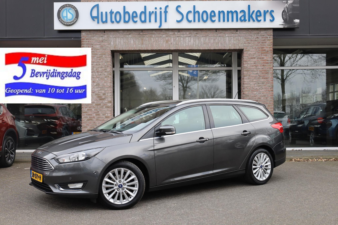 Ford Focus Wagon - 1.0 Titanium TREKHAAK NAVI 2xPDC RUITVERWARMING CRUISE 17"LMV NAP - AutoWereld.nl