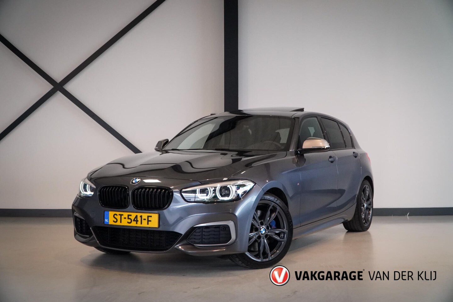 BMW 1-serie - M140i Edition Shadow High Executive | Schuifdak | H/K | Navi Prof. | Memory Seat | H/K | N - AutoWereld.nl
