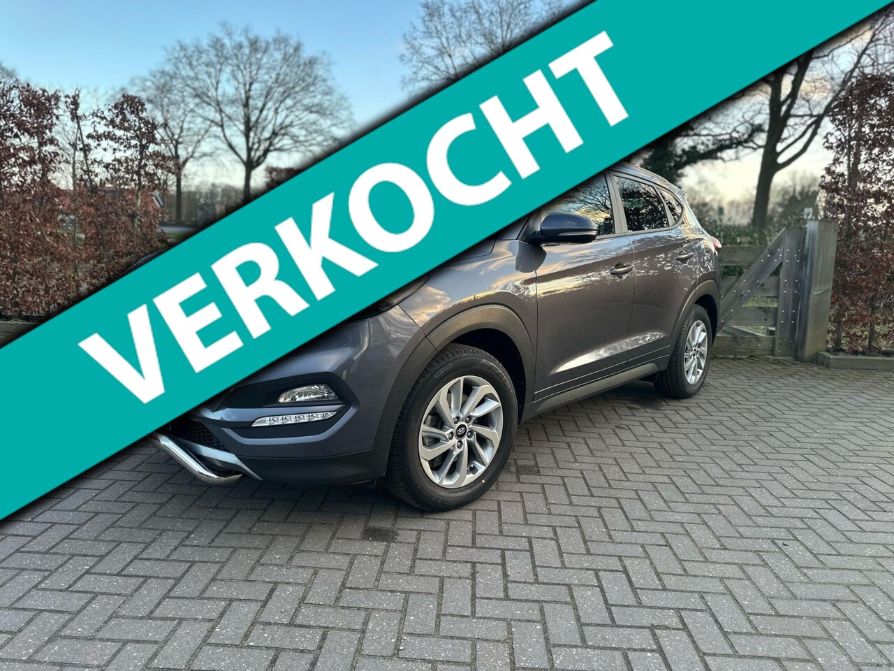 Hyundai Tucson - 1.6 T-GDi 177PK 4WD | Trekhaak 1900KG| 1e eigenaar| Camera| Stuurwielverwarming - AutoWereld.nl