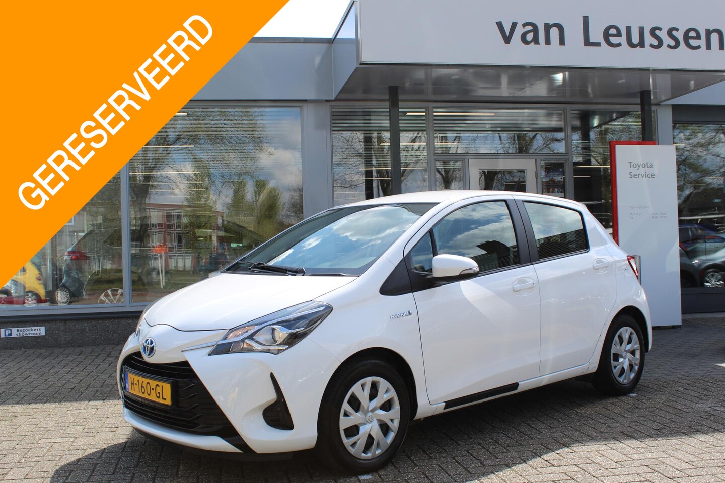 Toyota Yaris - 1.5 HYBRID HANDGAS AANGEPAST CRUISE NAVI CAMERA CLIMA - AutoWereld.nl