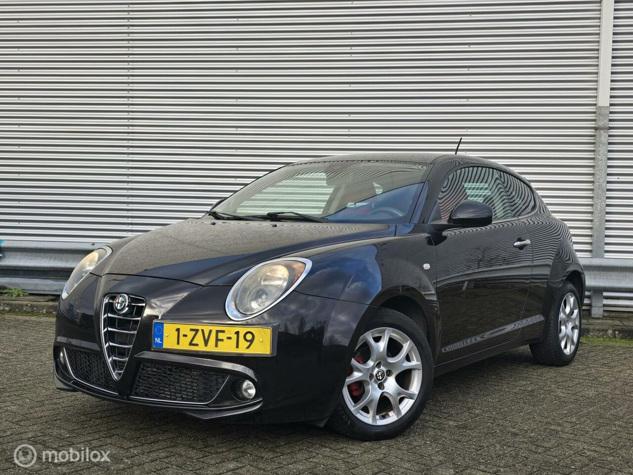 Alfa Romeo MiTo - 0.9 TwinAir Exclusive | Leer | Navi | Airco - AutoWereld.nl