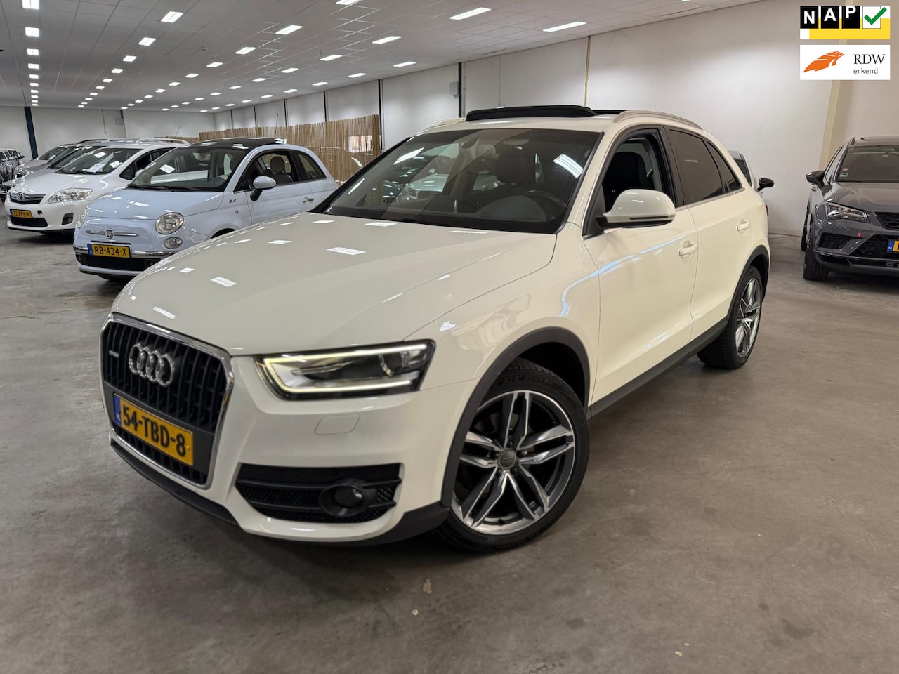Audi Q3 - 2.0 TFSI quattro / PANORAMADAK / AUTOMAAT / NAP / DEALER ONDERHOUDEN - AutoWereld.nl