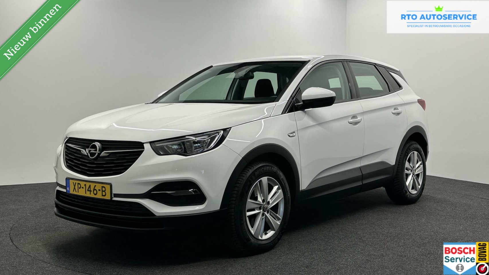 Opel Grandland X - 1.2 Turbo 120 Jaar Edition|Airco|Cruise|Navi| - AutoWereld.nl