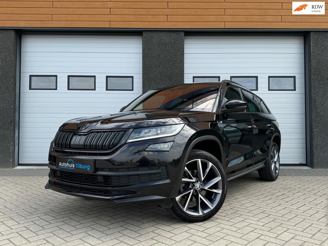Skoda Kodiaq - 1.5 TSI Sportline Pano Virtual Camera Trekhaak - AutoWereld.nl