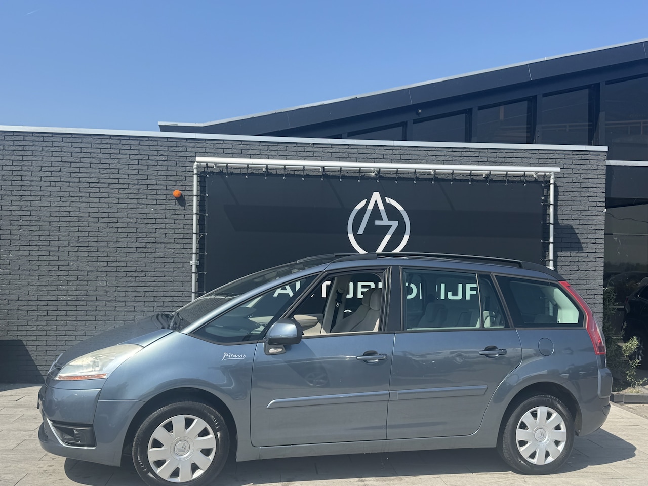 Citroën Grand C4 Picasso - 1.6 VTi Lumière 7p. 1.6 VTi Lumière 7p. - AutoWereld.nl