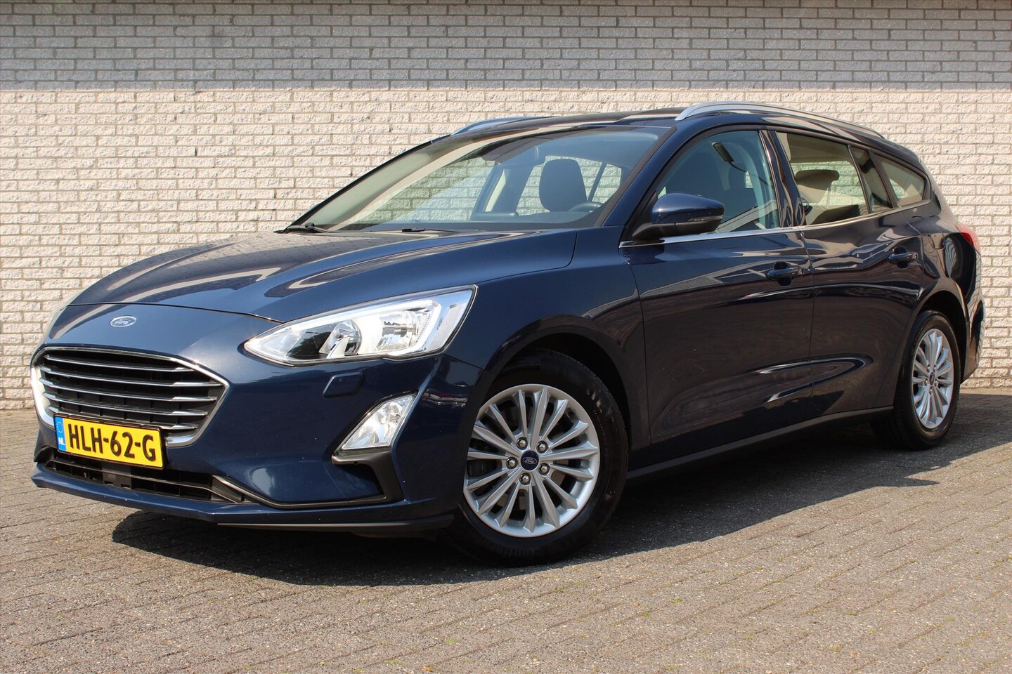 Ford Focus Wagon - 1.0 EcoBoost 125pk Aut Titanium Business | Stoelverwarming | Keyless | Cruise | NAVI | LED - AutoWereld.nl