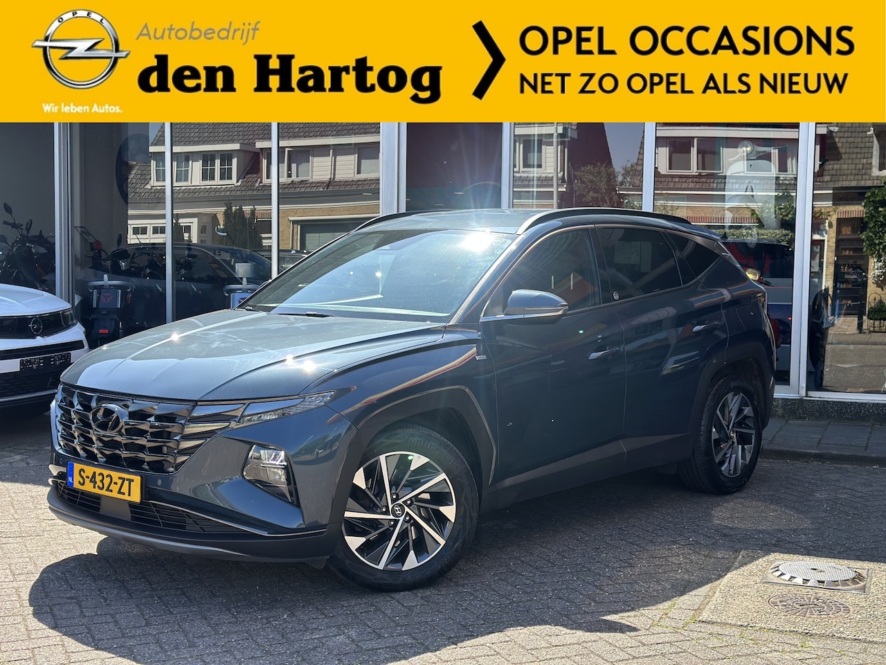 Hyundai Tucson - 1.6 T-GDI MHEV Comfort Stoel verwarming/ 3-zone climate/ camera/ zwarte hemel. - AutoWereld.nl