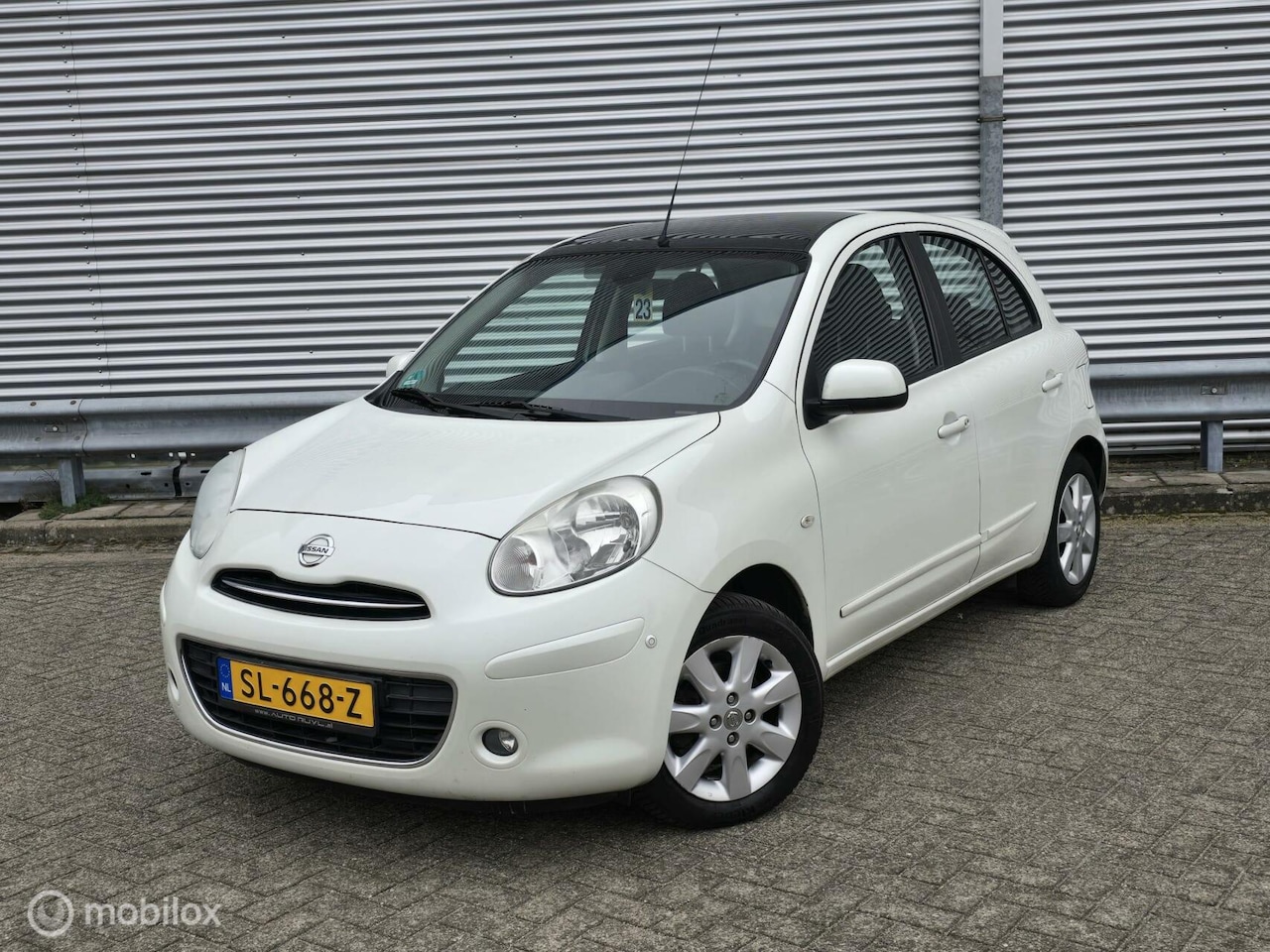 Nissan Micra - 1.2 DIG-S Tekna|Pano |Navi |Airco - AutoWereld.nl