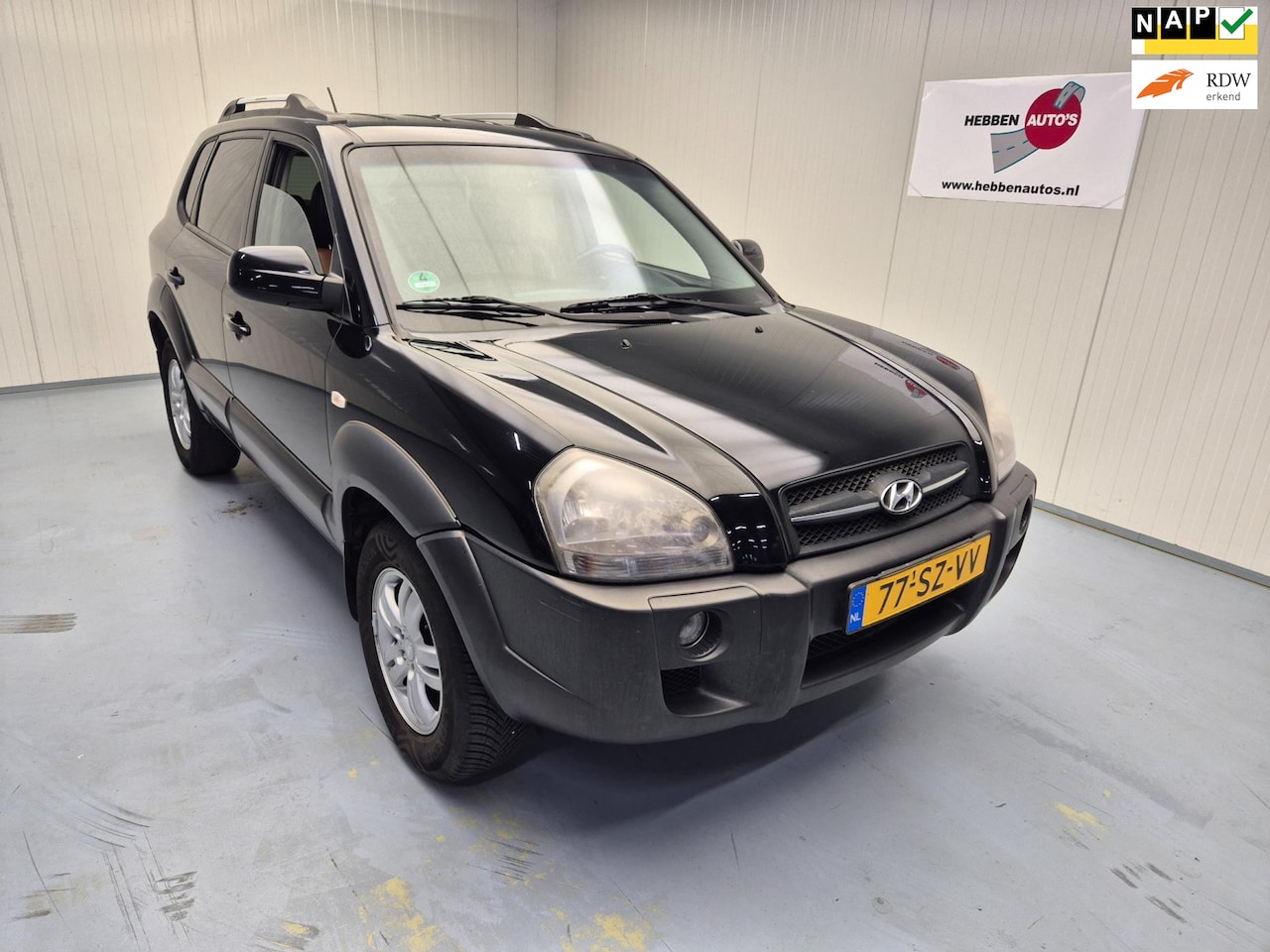 Hyundai Tucson - 2.0i Style World Cup edition Leer Airco Ecc Cruise Alu Pdc Trekhaak - AutoWereld.nl