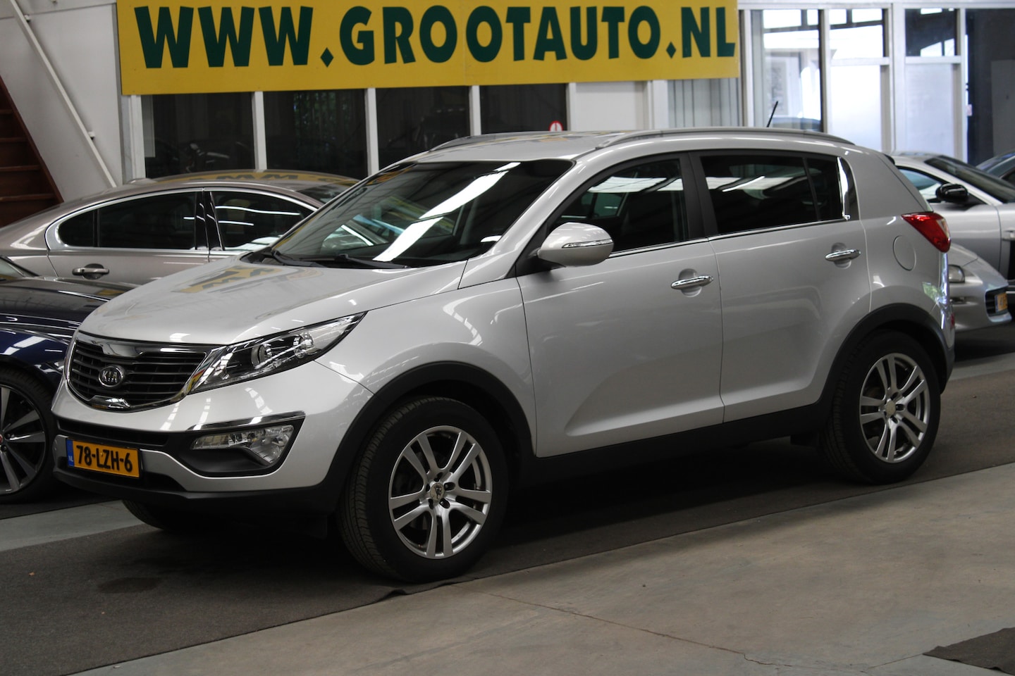 Kia Sportage - 2.0 X-ecutive Plus Pack NAP, Trekhaak, Airco, Cruise control - AutoWereld.nl