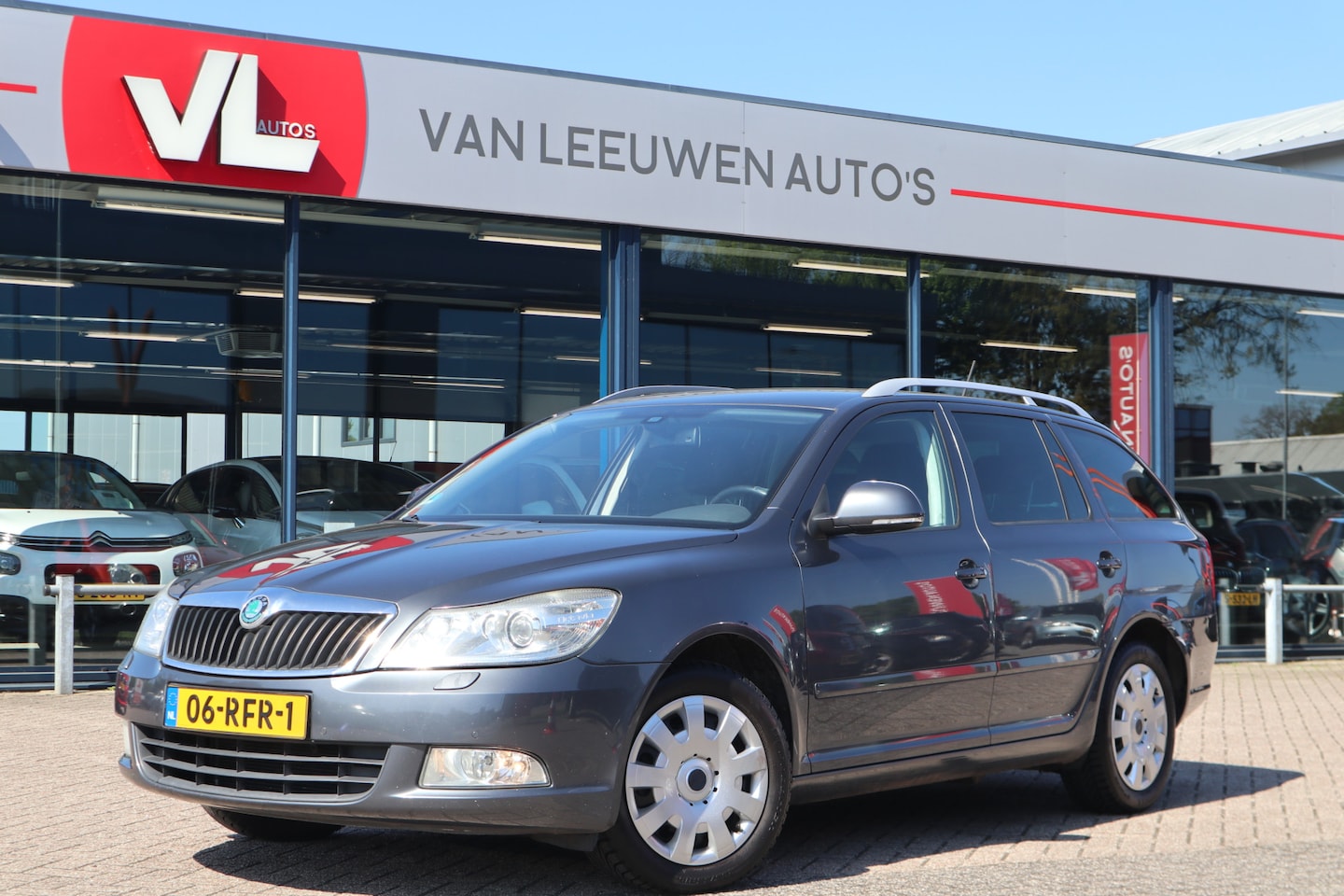 Skoda Octavia Combi - 1.8 TSI Elegance Business Line | Cruise | Sensoren | Clima - AutoWereld.nl