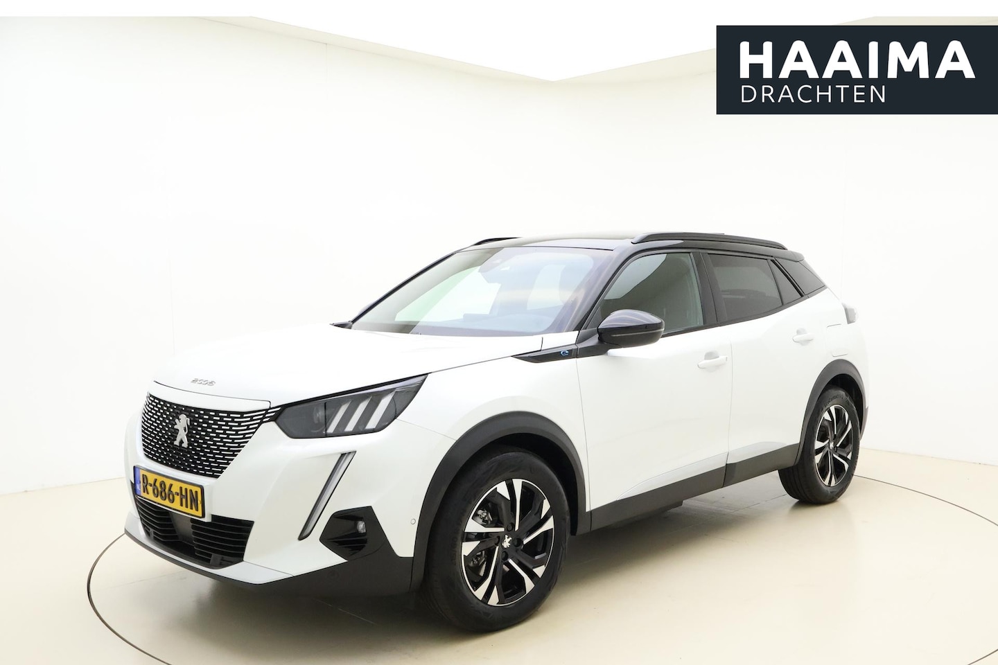 Peugeot e-2008 - EV GT 50 kWh 3-Fase | Adaptive Cruise Control | Panoramadak | Full LED | Navigatie | Camer - AutoWereld.nl