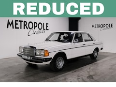 Mercedes-Benz 230 - Automaat . Schuifdak. In het klassiek wit(737). 1977 OLD PRICE: € 16.500 M0309