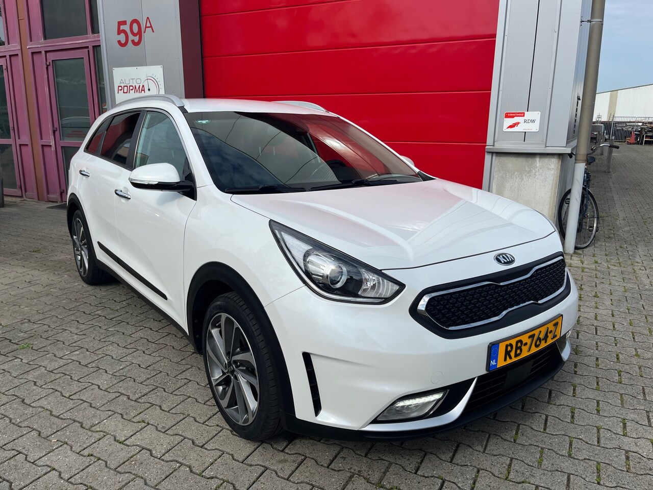 Kia Niro - 1.6 GDi Hybrid 105pk Automaat BusinessLine / Radar cruise / trekhaak / Stuur- en stoelverw - AutoWereld.nl
