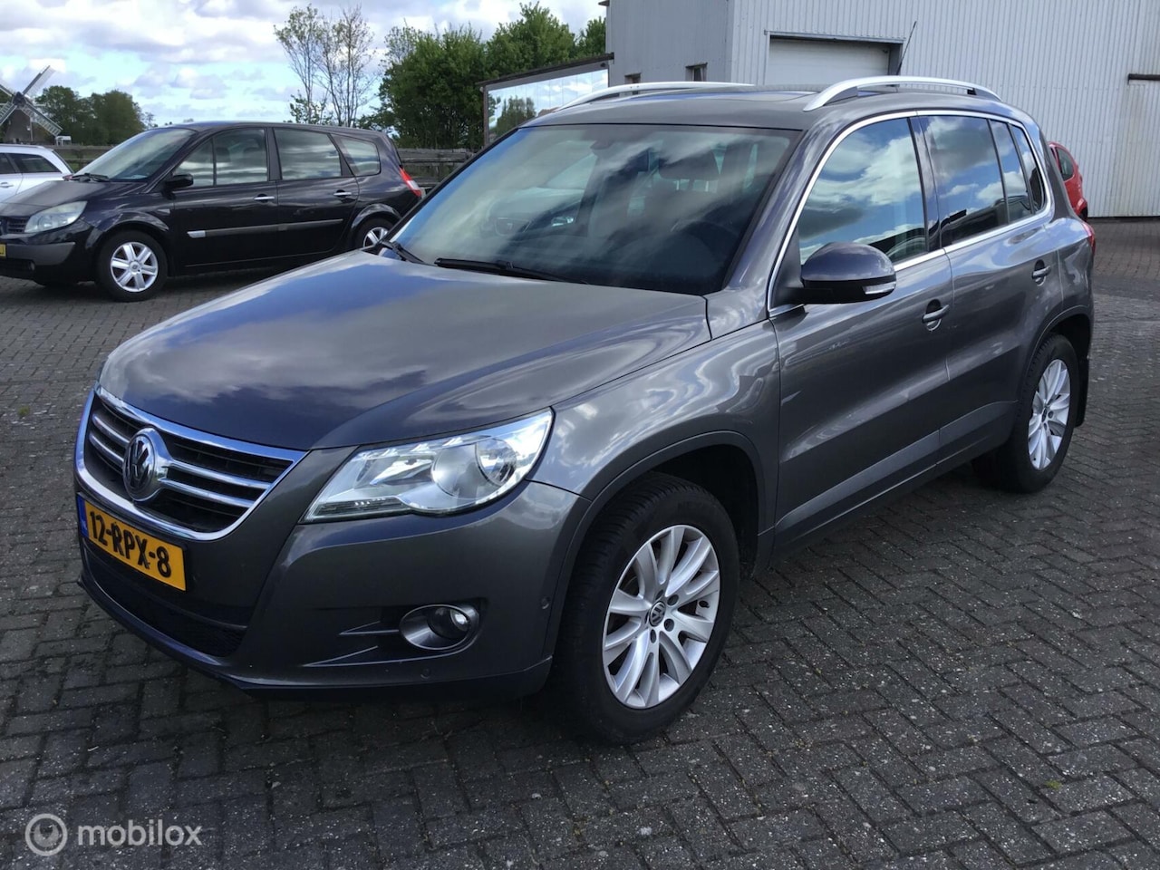Volkswagen Tiguan - 1.4 TSI Sport&Style - AutoWereld.nl