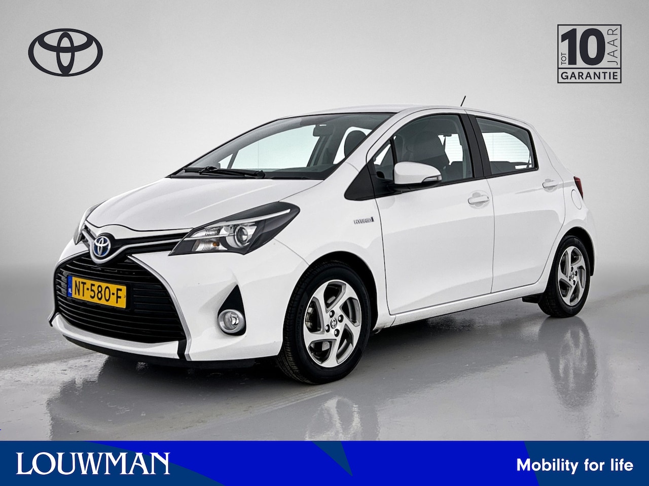 Toyota Yaris - 1.5 Hybrid Aspiration Limited Navigatie - Camera - Climate Control - Velgen - AutoWereld.nl